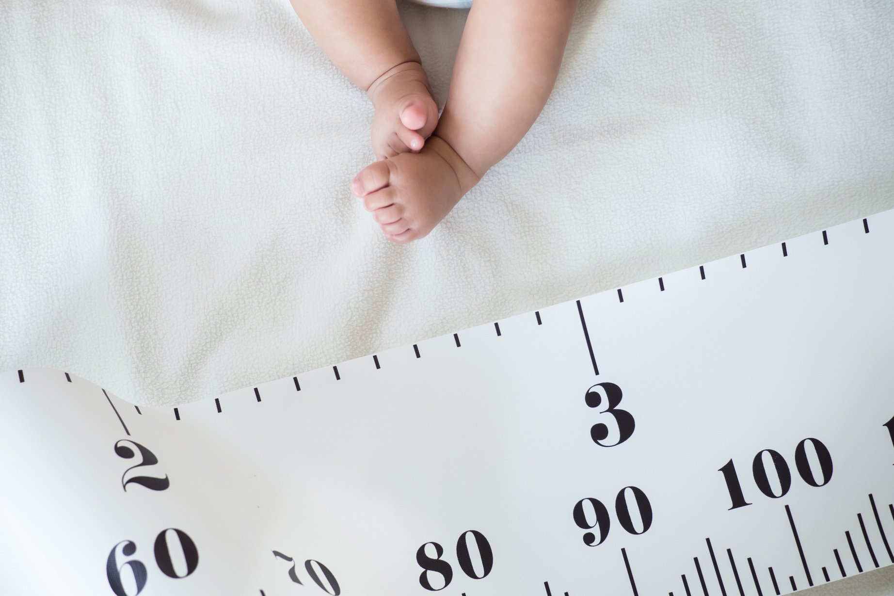 Baby Foot and measuring tape.